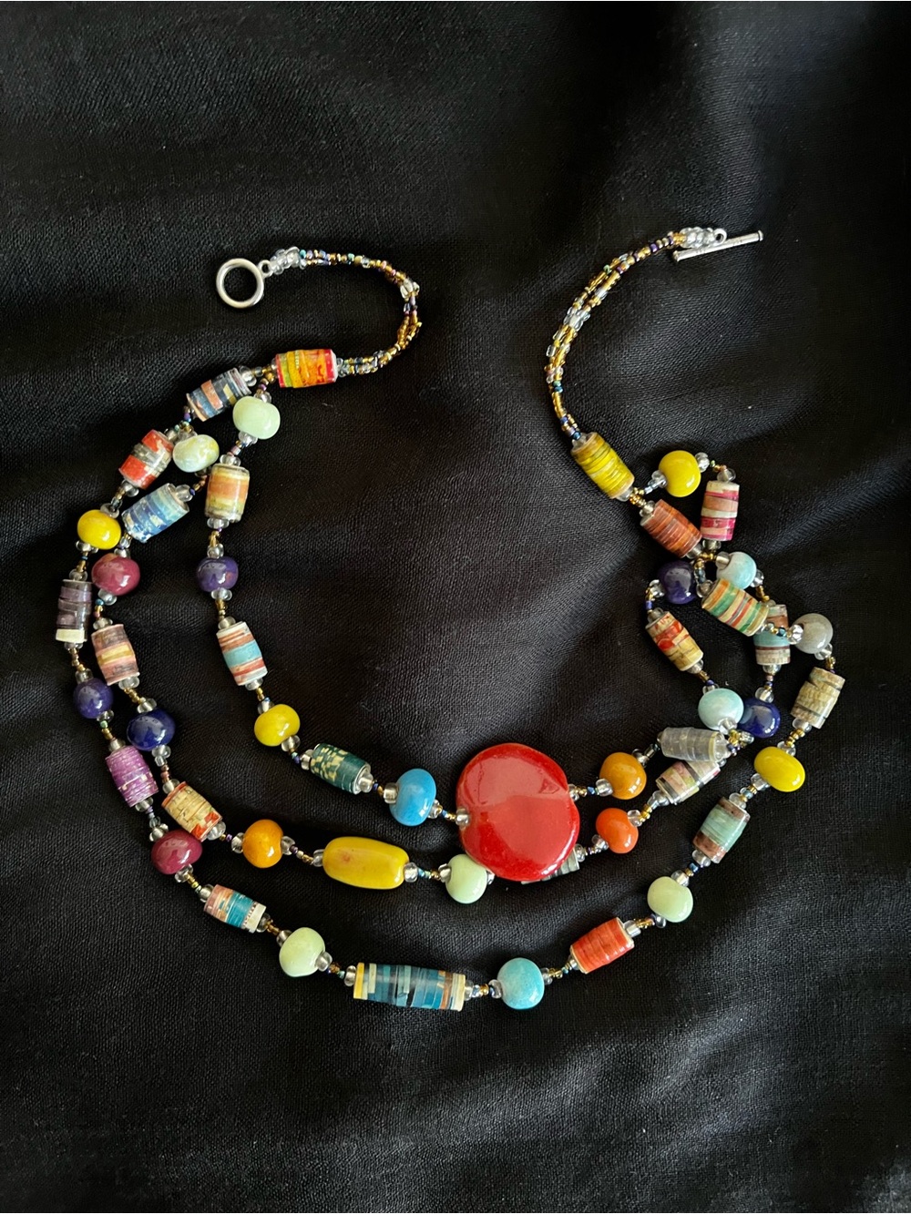 Handcrafted Multi-Strand Beaded Necklace with Red Center Accent